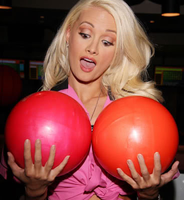 If your are feeling that your Breast Implants are too big, like the bowling balls Holly Madison is holding at the Bowling For Boobies Fundraiser in Hollywood, CA, it might make sense to have them reduced or even removed. About 1% of women who get Breast Implants will elect to have them removed at some point in their life.