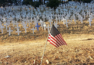 The hillside near the Lafayette, CA, BART station is a large reminder that war is still happening almost 100 years after the end of the war to end all wars.
