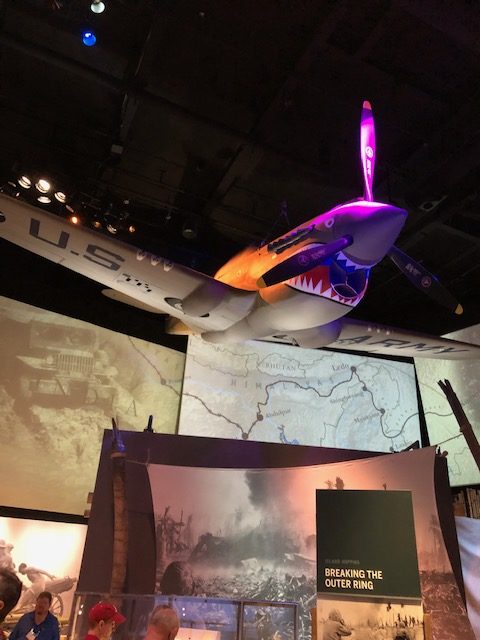 A shark-faced P-40 Warhawk hangs in the "Road to Tokyo" exhibit at the National World War II Museum in New Orleans, LA.